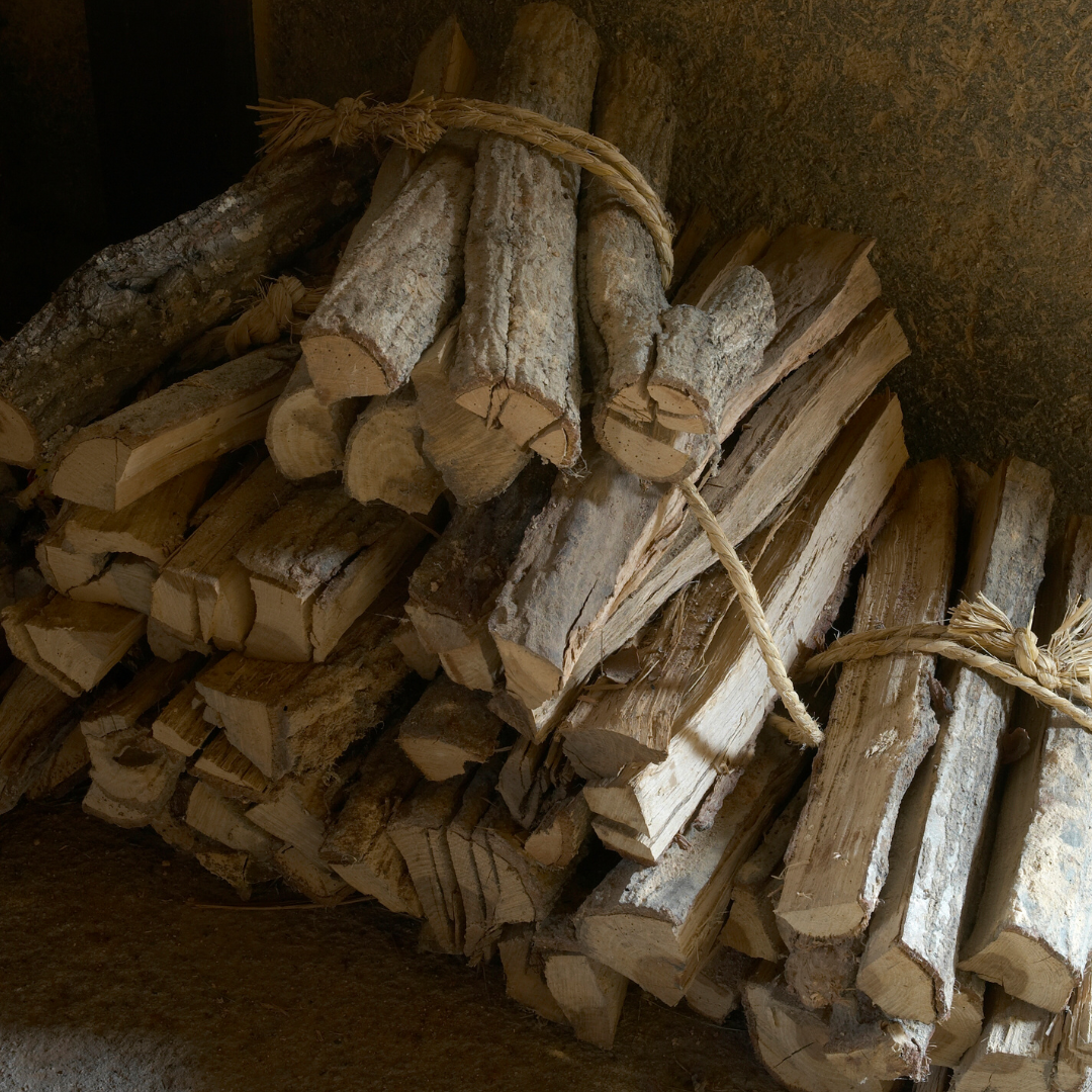 bundles of wood tied up with rope